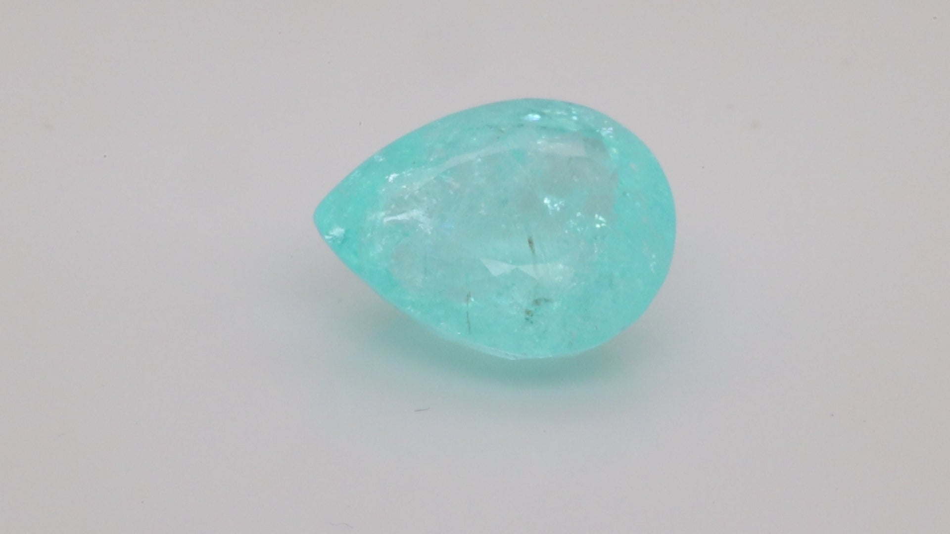 8.14 CARAT PEAR SHAPE NEON BLUE PARAIBA  (PR030)